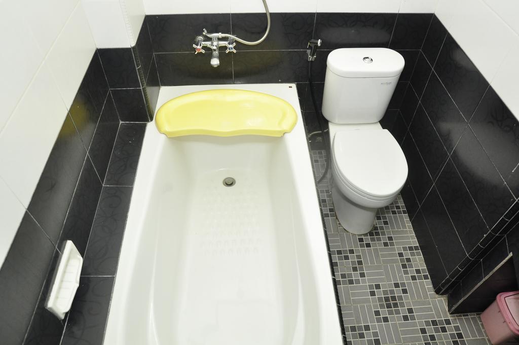 Hotel Andhika Syariah Samarinda Rum bild
