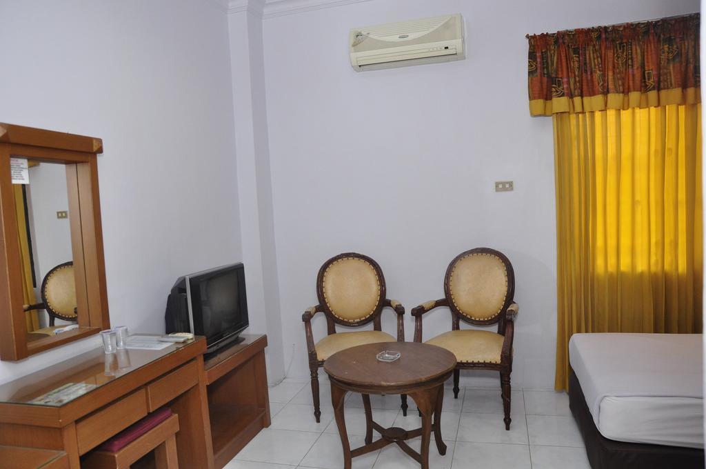 Hotel Andhika Syariah Samarinda Rum bild