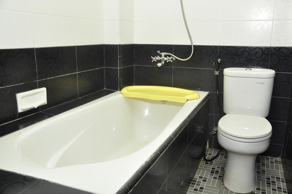 Hotel Andhika Syariah Samarinda Rum bild