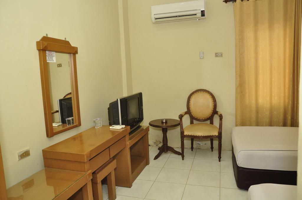 Hotel Andhika Syariah Samarinda Rum bild