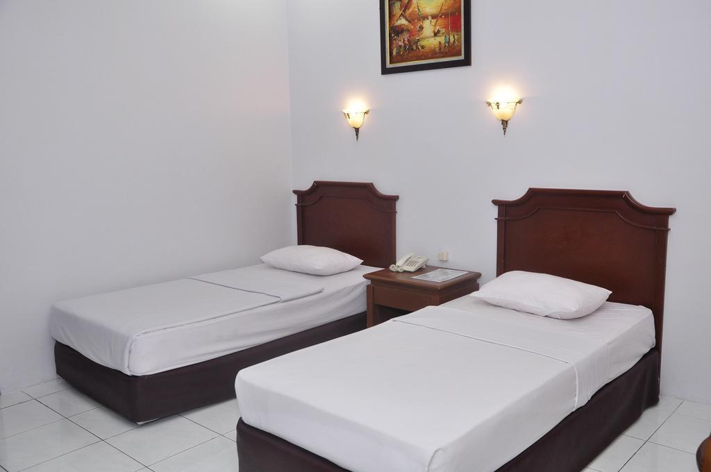 Hotel Andhika Syariah Samarinda Rum bild