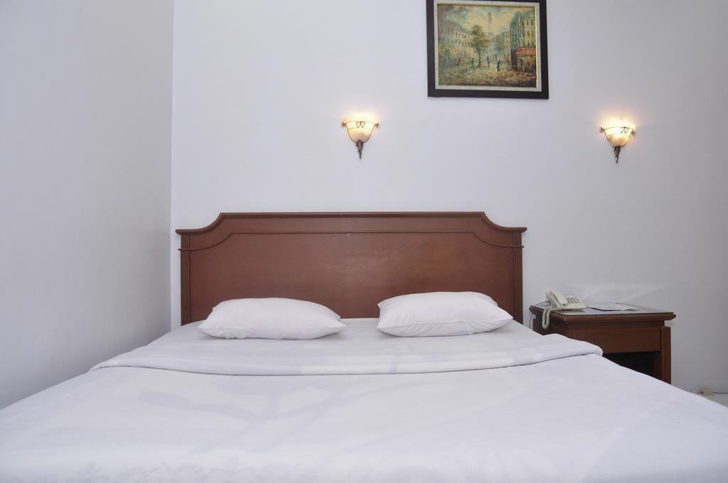 Hotel Andhika Syariah Samarinda Rum bild