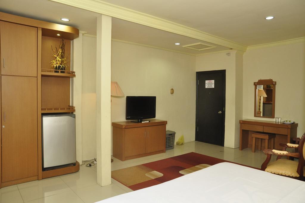 Hotel Andhika Syariah Samarinda Rum bild