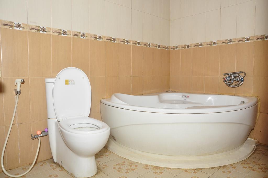 Hotel Andhika Syariah Samarinda Rum bild